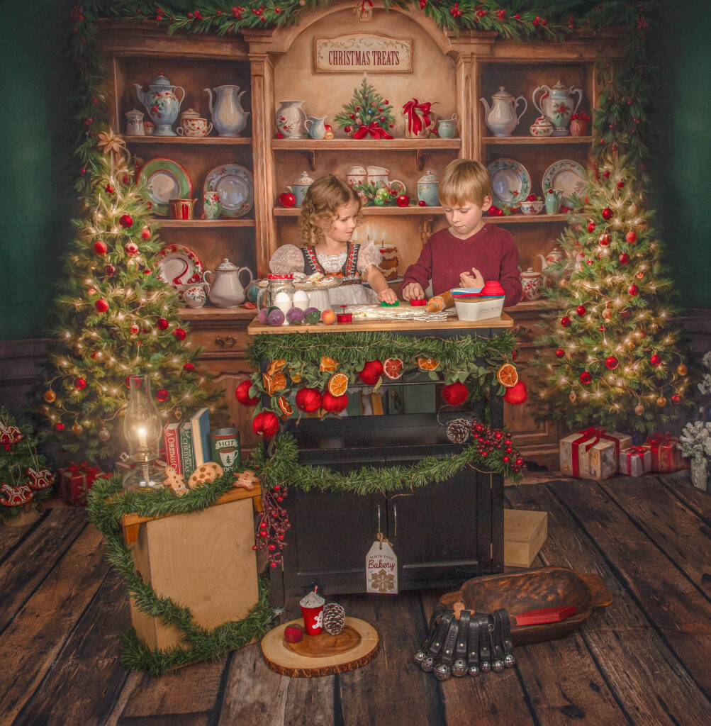 An award-winning photographer capturing sweet moments of a family during a Christmas baking session.