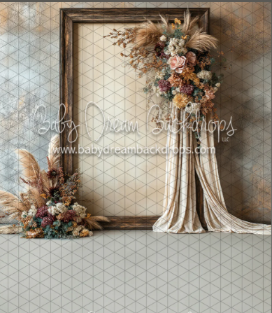 Mother’s Day Portrait Ottawa setup. Rustic floral photography backdrop featuring a vintage wooden frame adorned with dried flowers, pampas grass, and fabric draping. Perfect for elegant  Mothers Day portrait sessions,