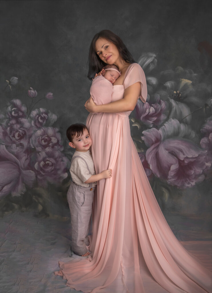 Ottawa newborn photography of mom with baby and big brother