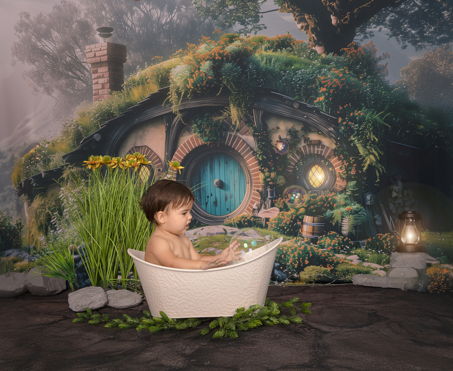 Baby giggling during splash session after cake smash in Ottawa studio